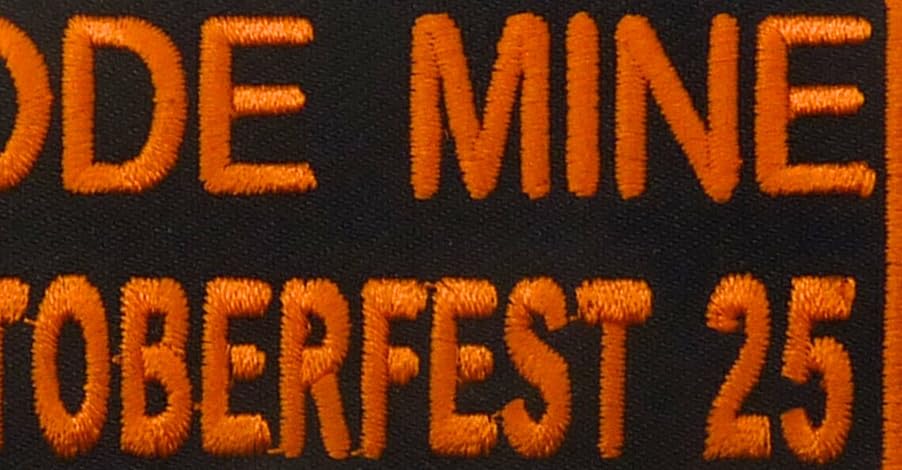 PatchStop I Rode Mine Biketoberfest 25 Embroidered Patch, Black and Orange, 3.5" x 1.75", Iron On or Sew On — detail view 2