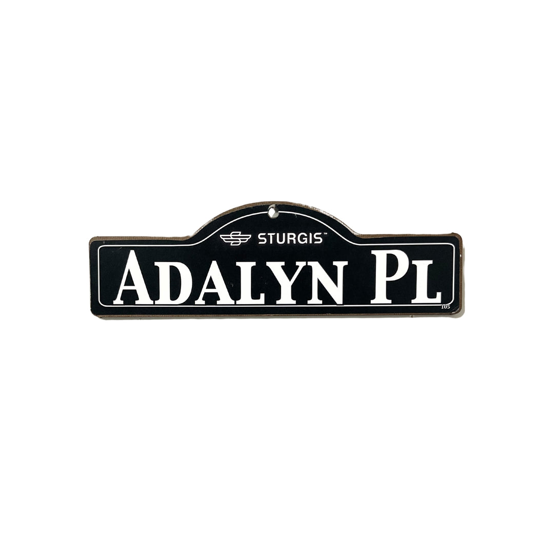 Adalyn Sturgis wooden street name sign with white lettering on black