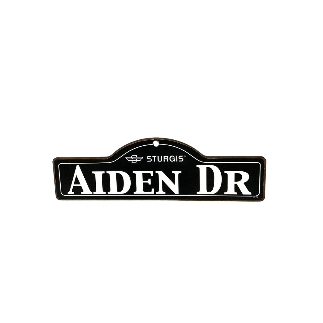 Aiden Sturgis wooden street name sign with white lettering on black