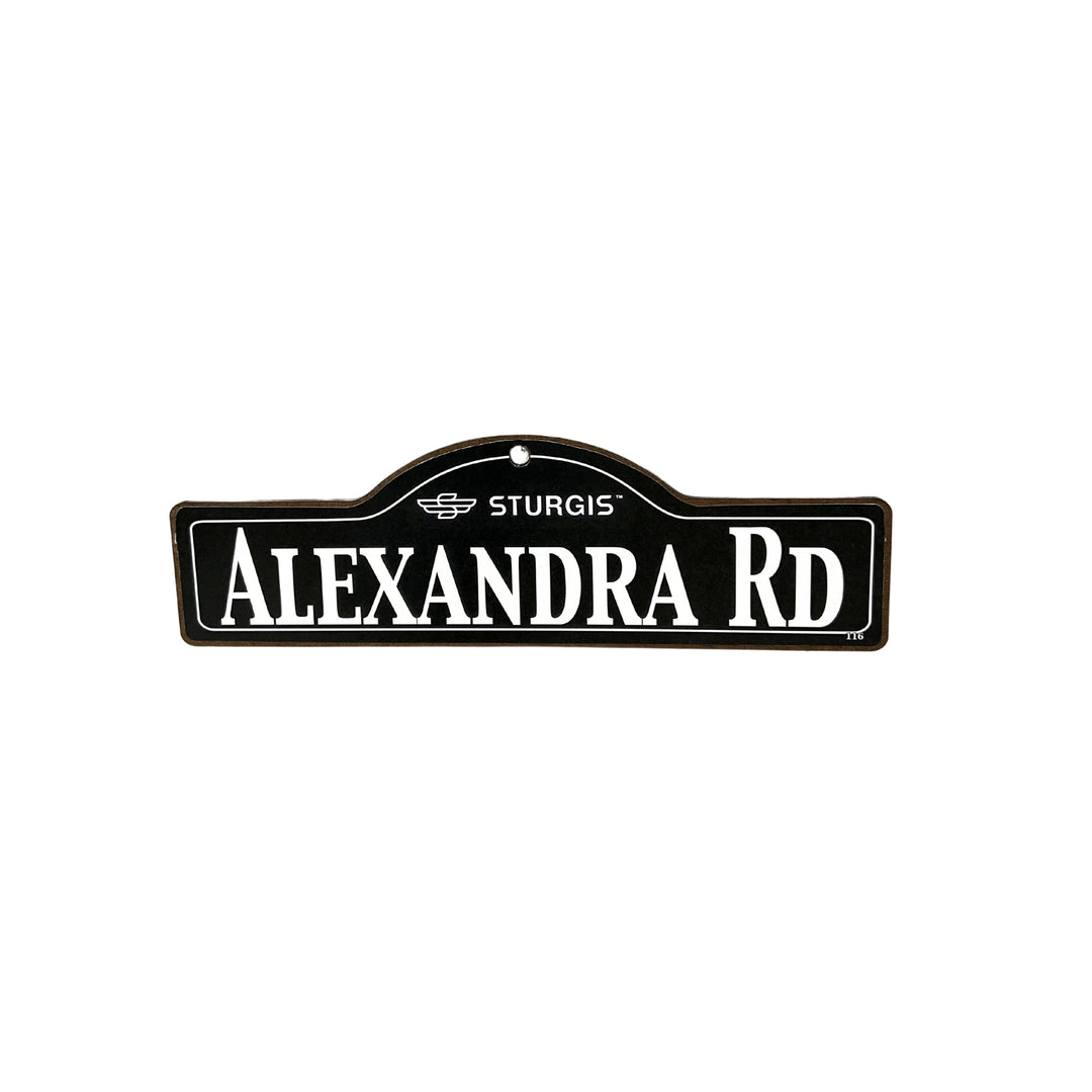 Alexandra Sturgis wooden street name sign with white lettering on black