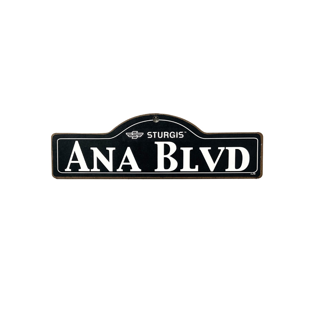 Ana Sturgis wooden street name sign with white lettering on black