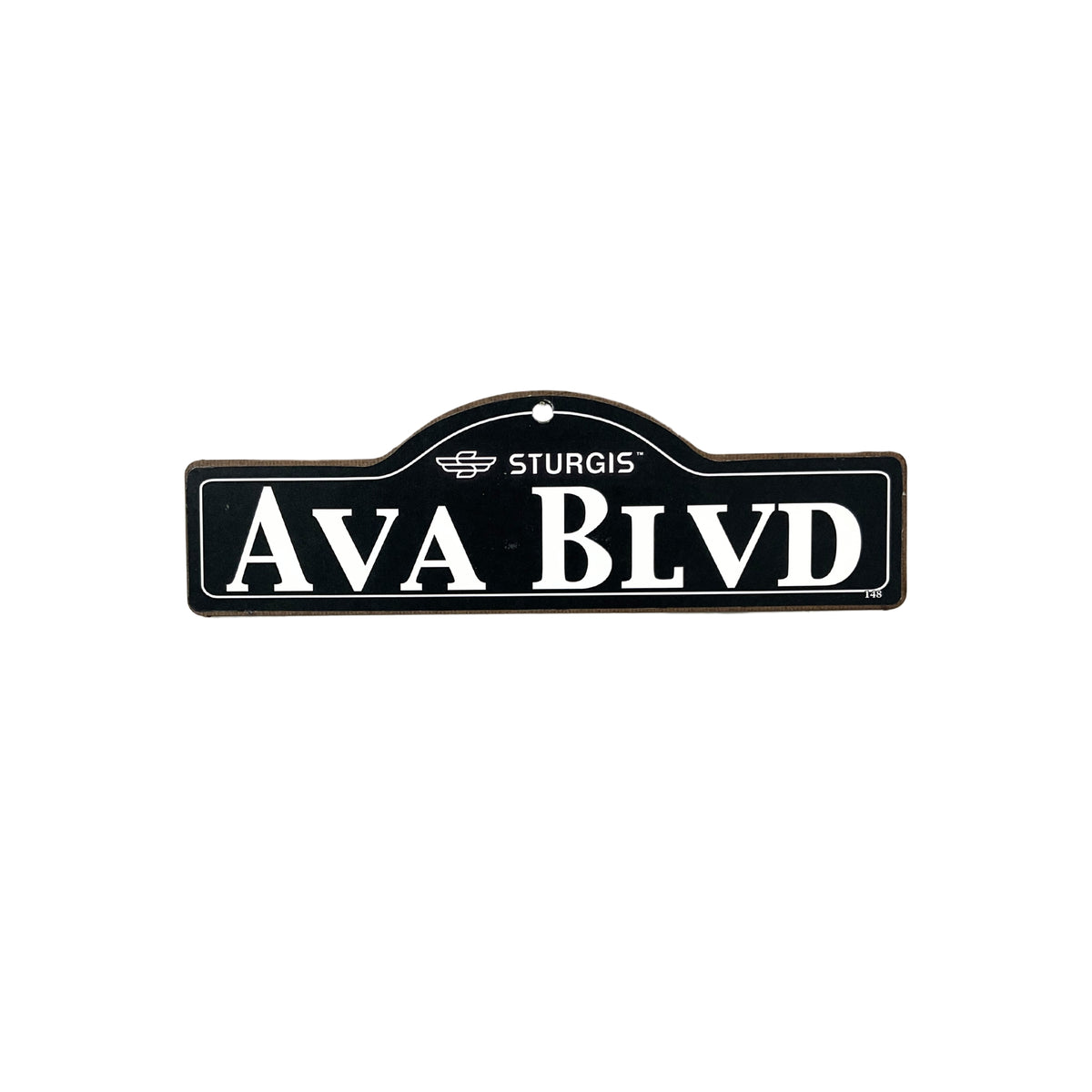 Ava Sturgis wooden street name sign with white lettering on black