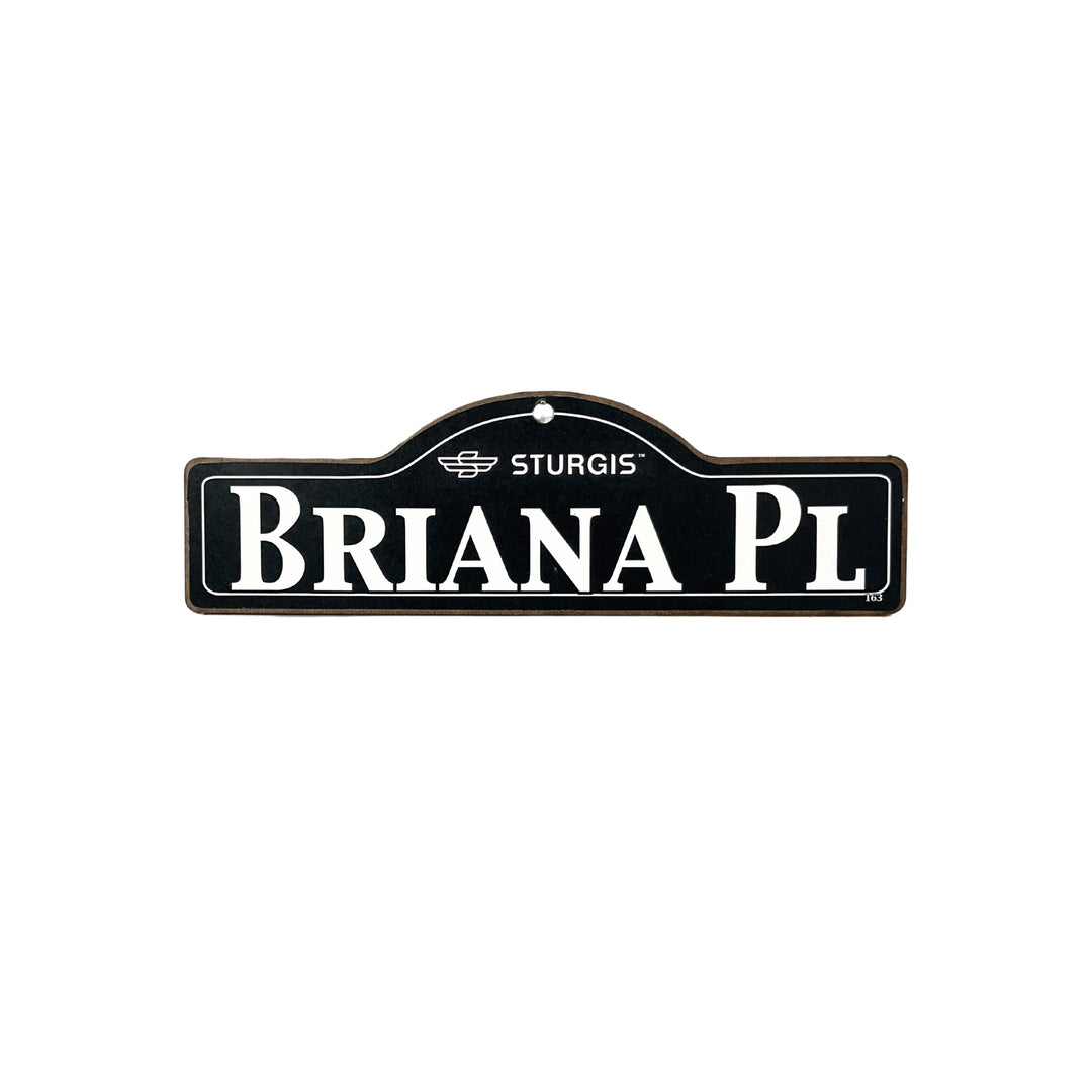 Briana Sturgis wooden street name sign with white lettering on black