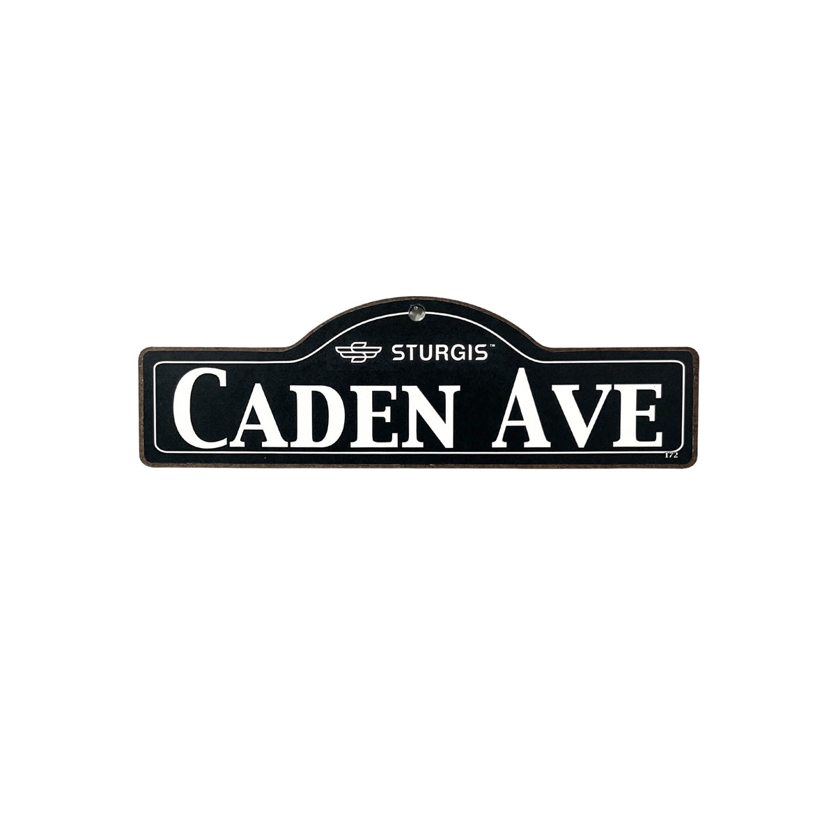 Caden Sturgis wooden street name sign with white lettering on black