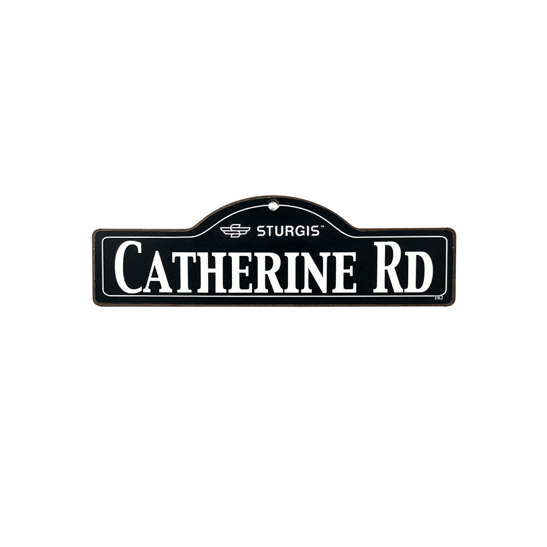 Catherine Sturgis wooden street name sign with white lettering on black