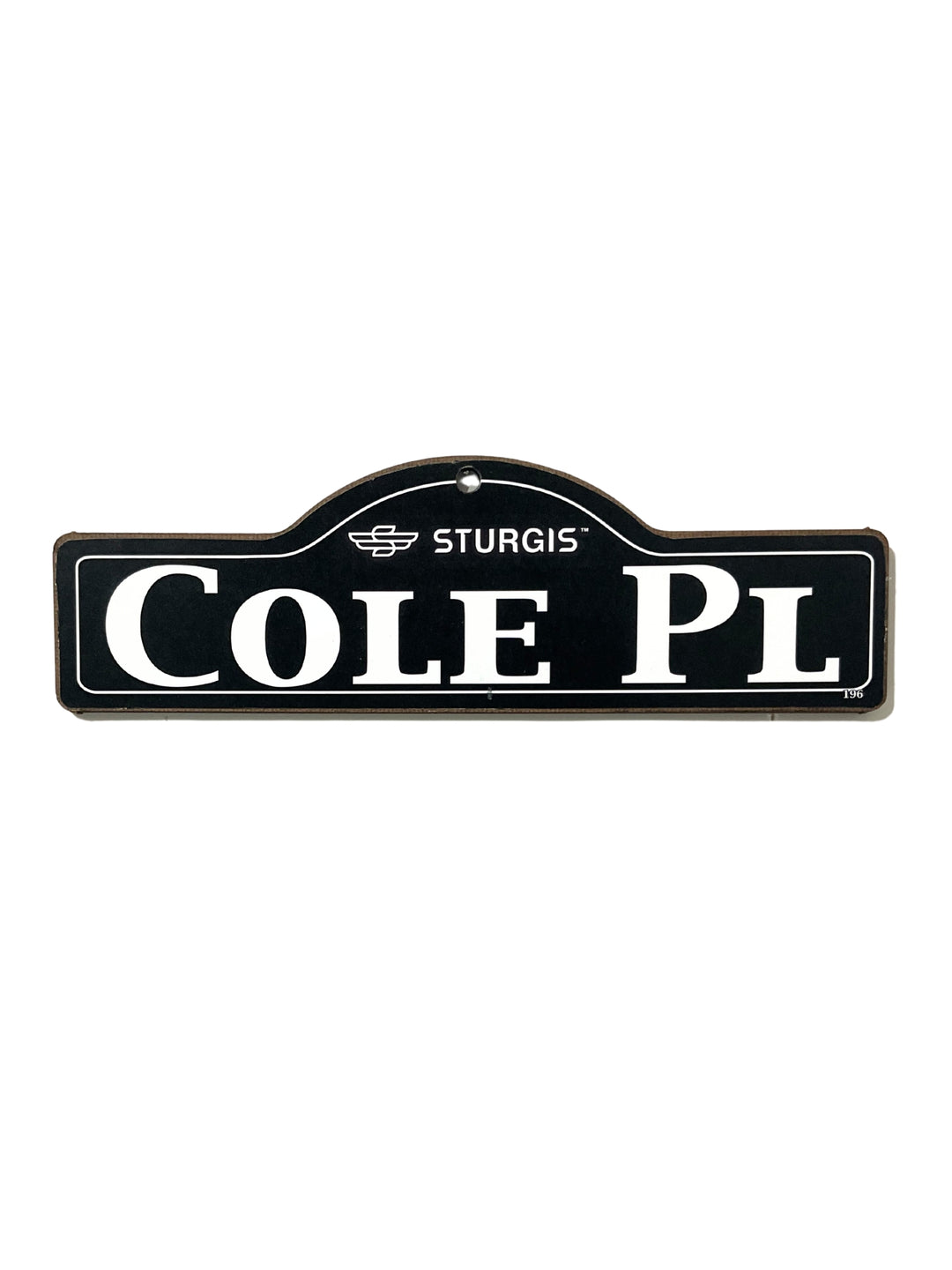 Cole Sturgis wooden street name sign with white lettering on black