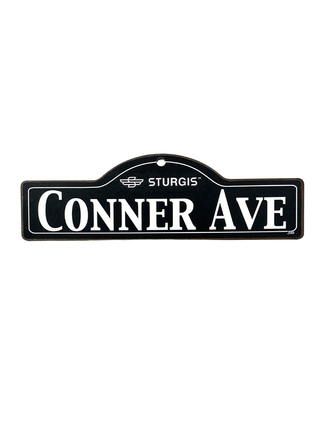 Conner Sturgis wooden street name sign with white lettering on black