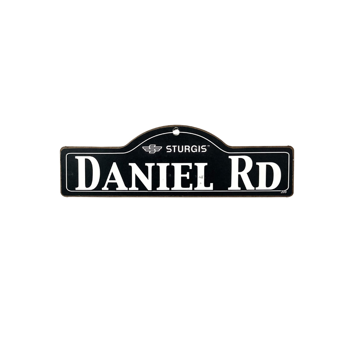 Daniel Sturgis wooden street name sign with white lettering on black