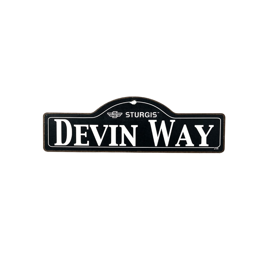 Devin Sturgis wooden street name sign with white lettering on black