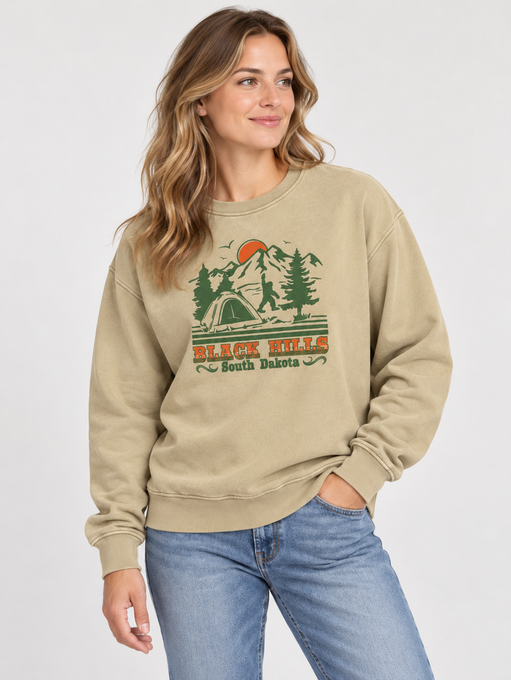 AI-generated female model wearing unisex Black Hills Bigfoot camping crewneck, front