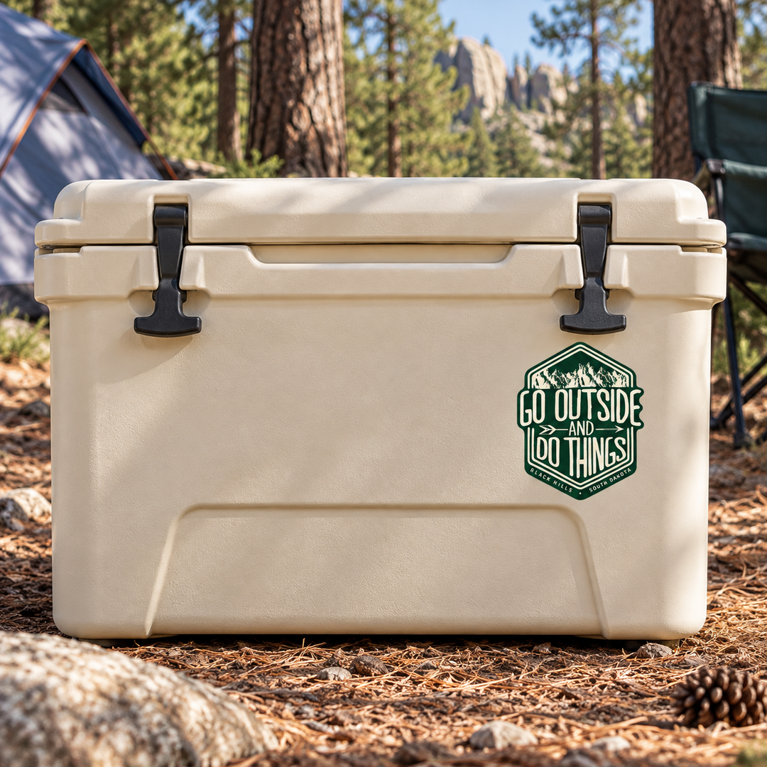 Black Hills Go Outside and Do Things Hexagon Sticker on a camping cooler — realistic scale lifestyle display; accessories not included