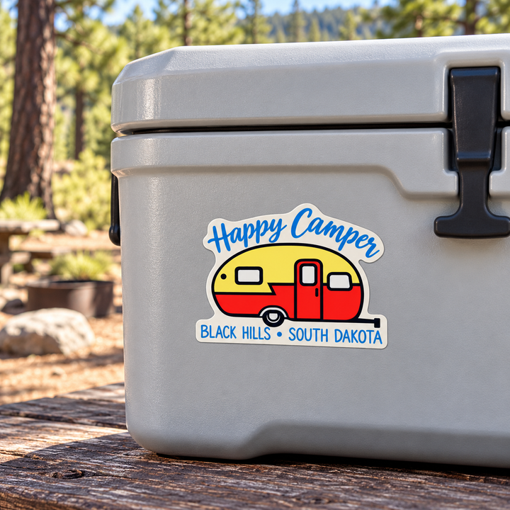 Black Hills Happy Camper Retro Trailer Sticker on a cooler — lifestyle display mockup