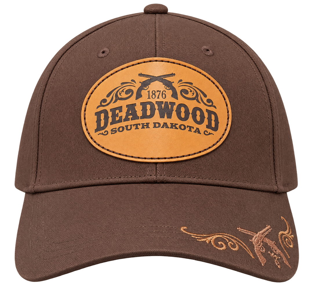 Brown Deadwood 1876 crossed revolvers leather patch hat, front product view, transparent background