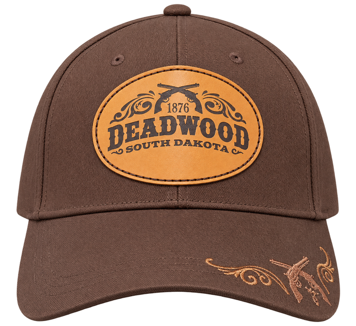 Brown Deadwood 1876 crossed revolvers leather patch hat, front product view, transparent background