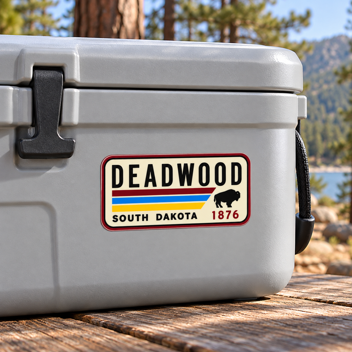 Deadwood 1876 Retro Stripe &amp; Bison Sticker on a cooler — lifestyle display mockup