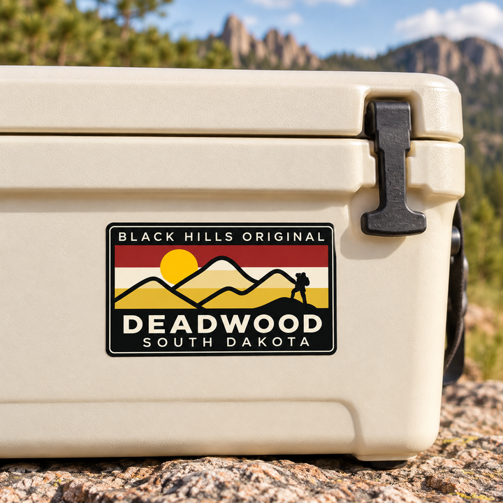 Deadwood Black Hills Original Mountain Hiker Sticker on a cooler — lifestyle display mockup; accessories not included