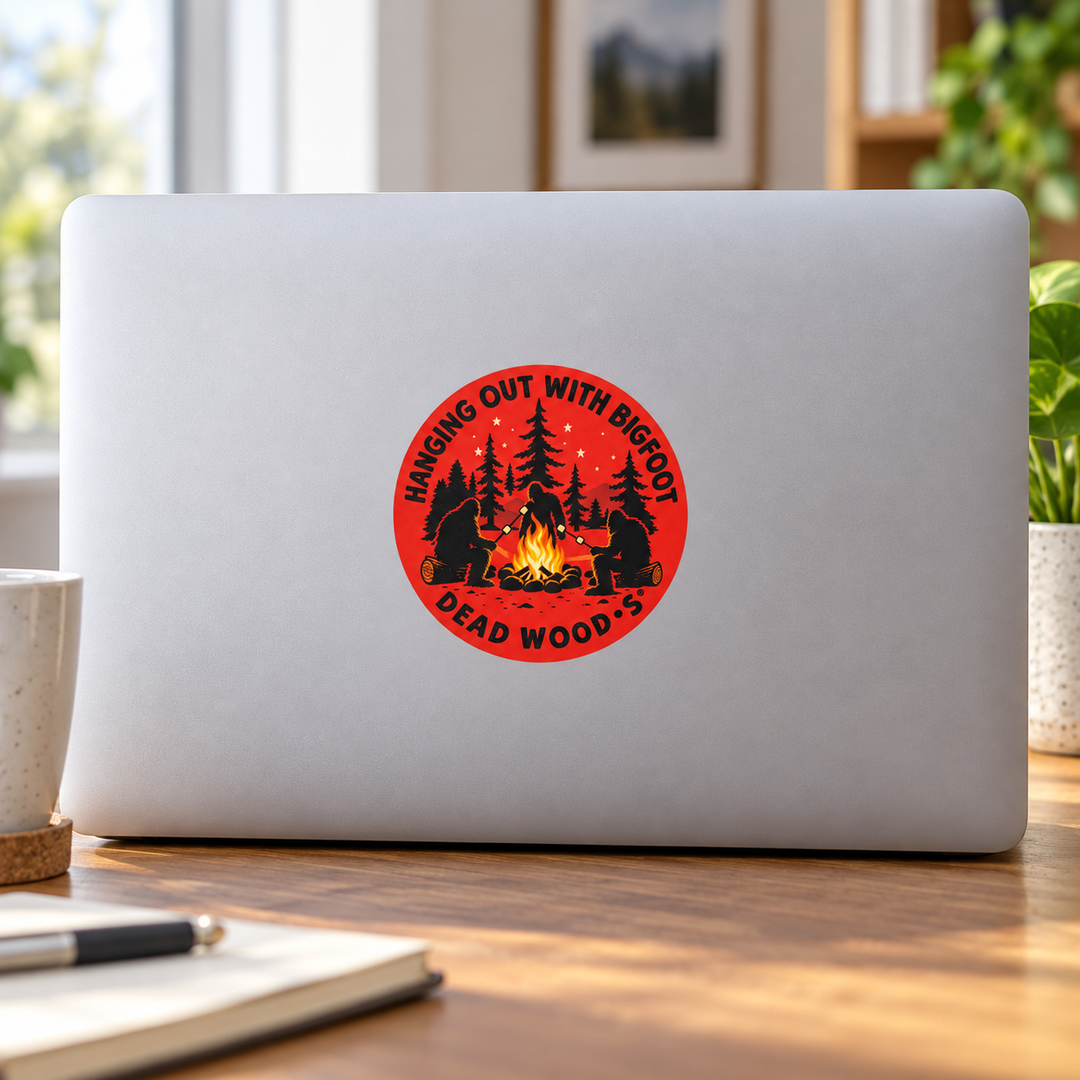 Deadwood Hanging Out with Bigfoot Campfire Sticker on a laptop — lifestyle display mockup; accessories not included