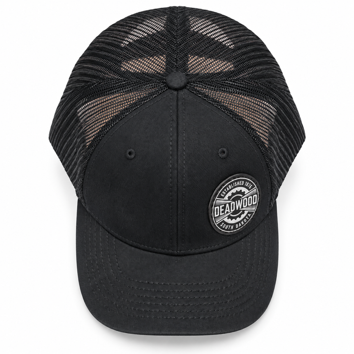 Deadwood Heritage Badge Leather Patch Trucker Hat – Black; top product view