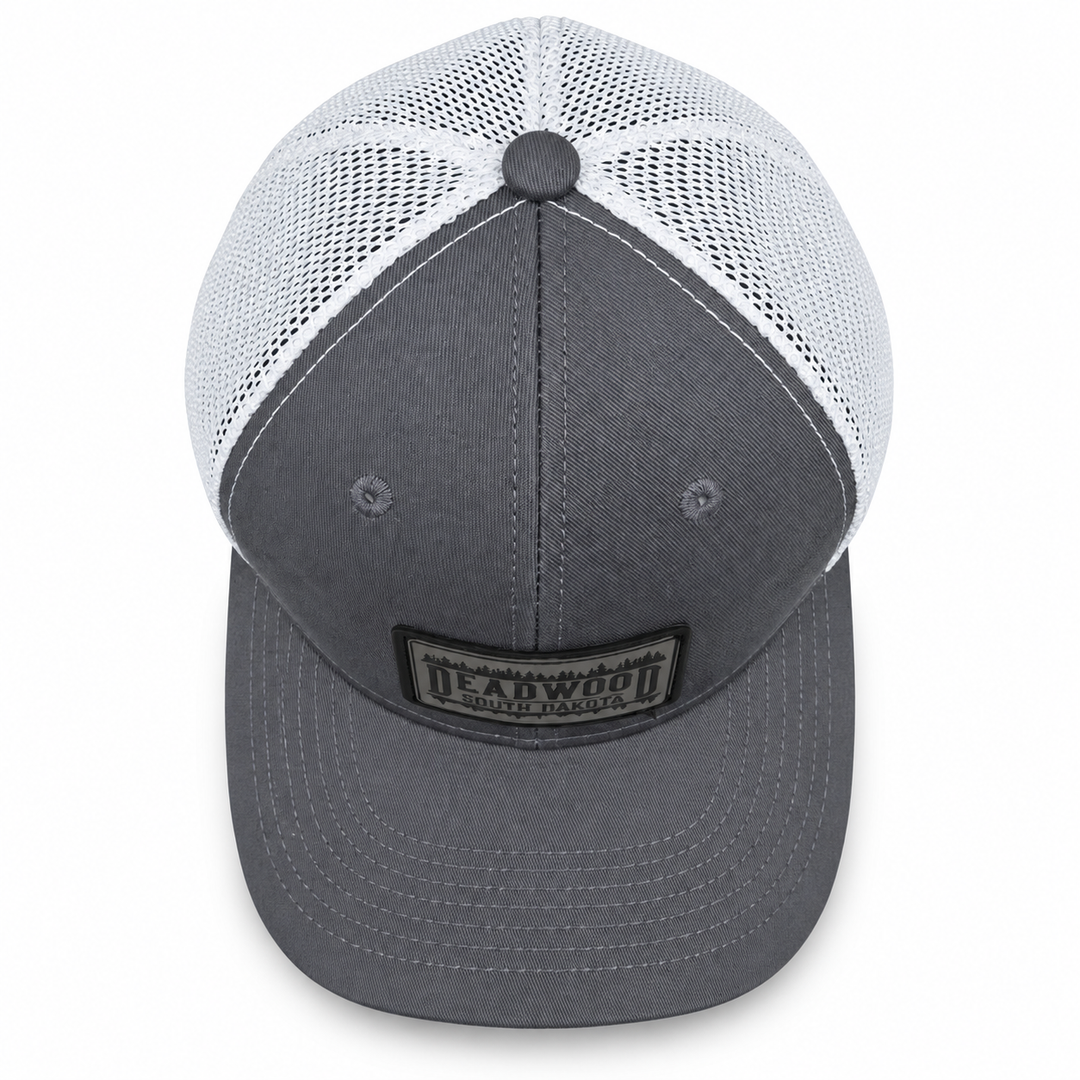 Top view of gray and white Deadwood South Dakota leather patch mesh hat