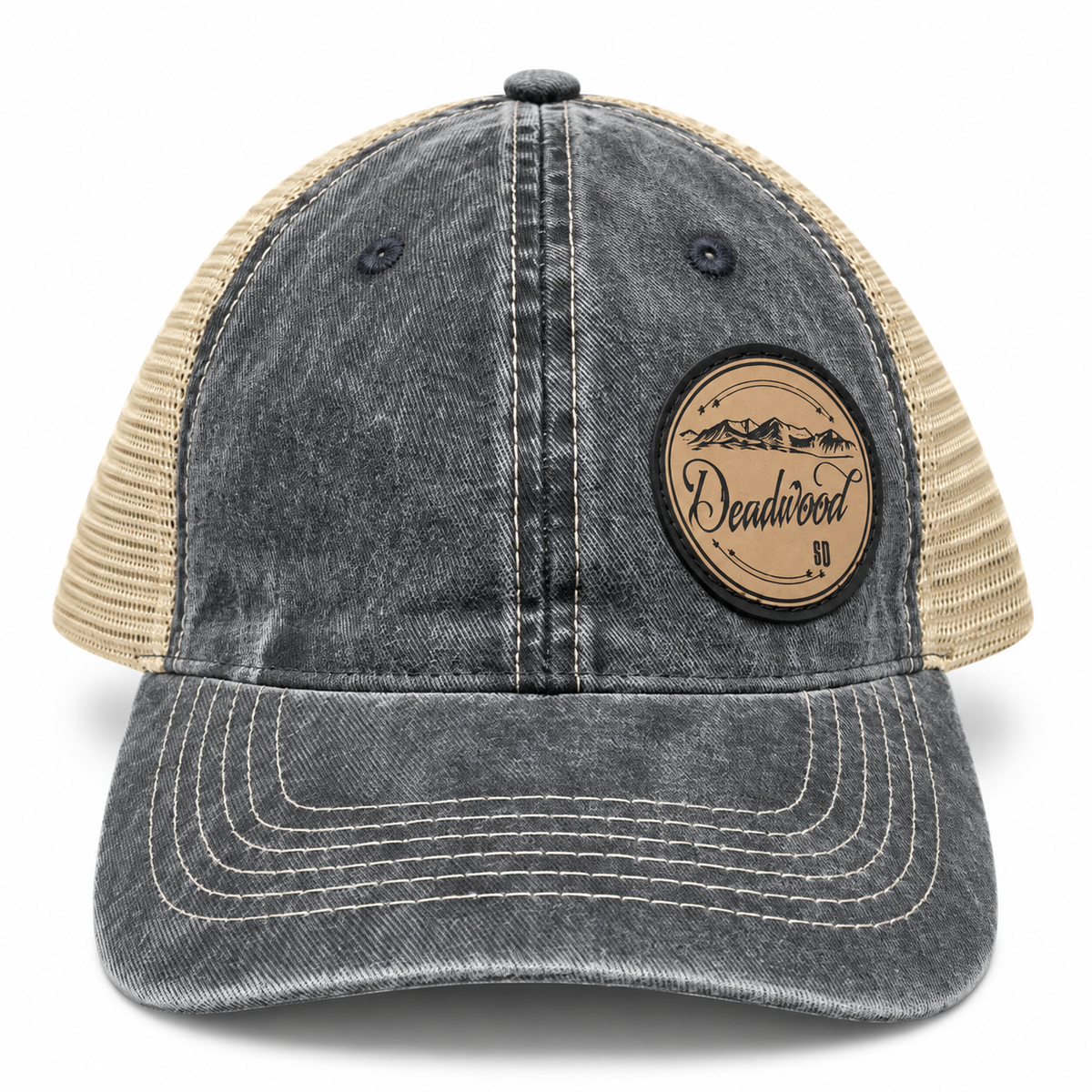 Deadwood Mountain Badge Leather Patch Trucker Hat – Washed Charcoal & Tan; front product view