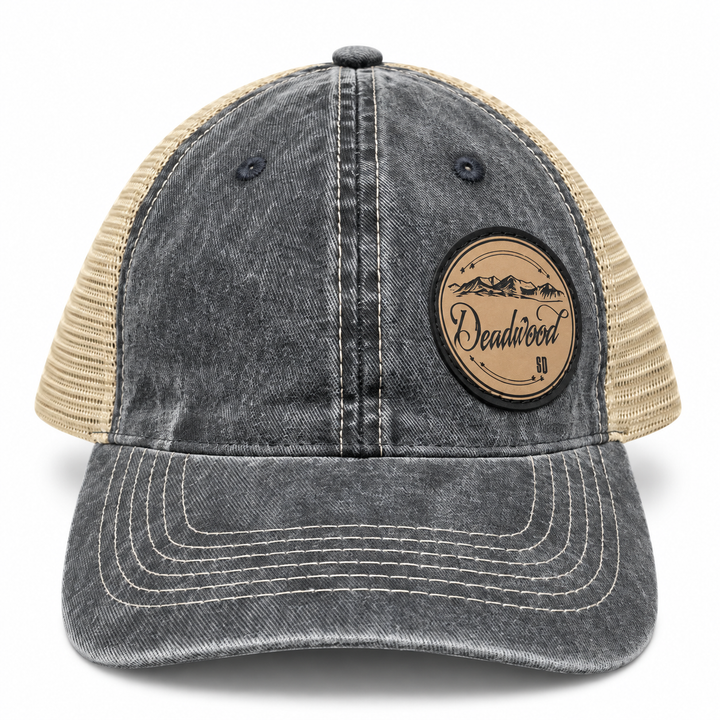 Deadwood Mountain Badge Leather Patch Trucker Hat – Washed Charcoal &amp; Tan; front product view