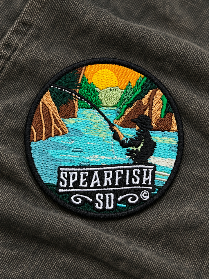 Spearfish South Dakota Fishing Embroidered Patch — on dark fabric