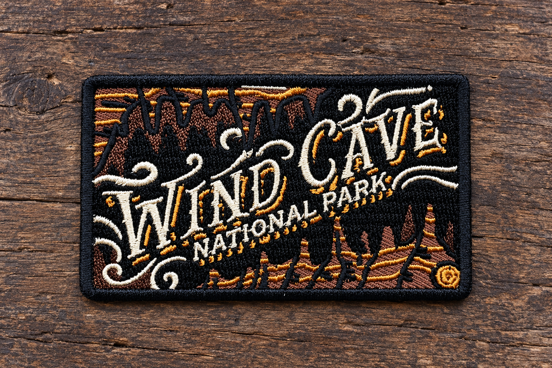 Wind Cave National Park Embroidered Patch — on weathered wood
