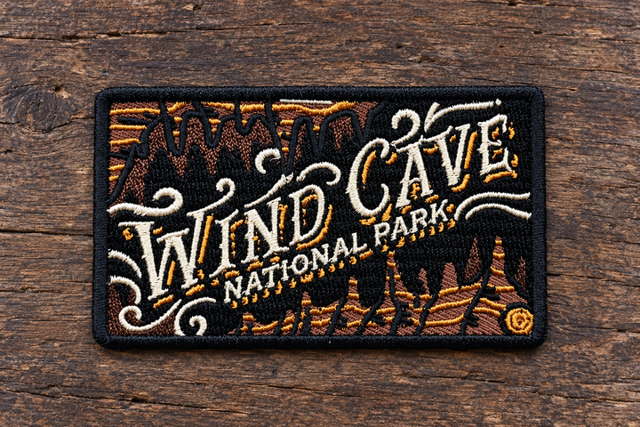 Wind Cave National Park Embroidered Patch — on weathered wood