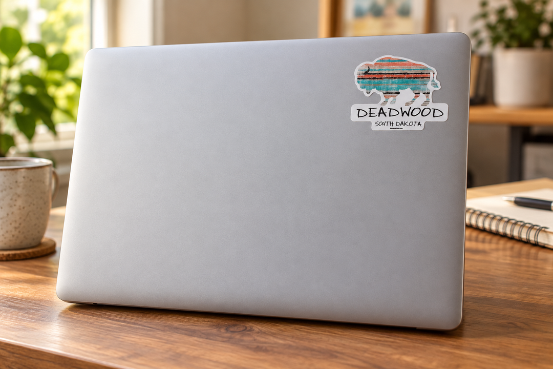 Deadwood Pastel Stripe Bison Sticker on a laptop cover at realistic scale