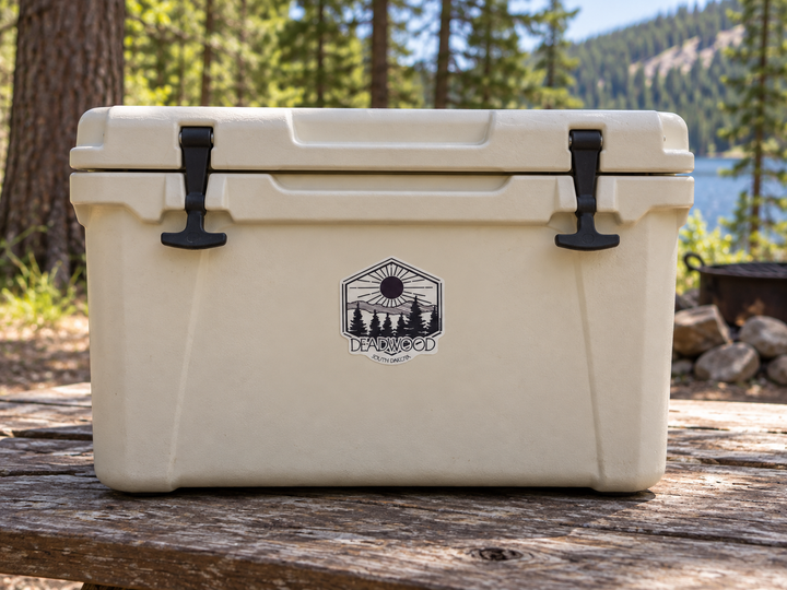 Deadwood Sunrise Pine Forest Hexagon Sticker on a camping cooler at realistic scale