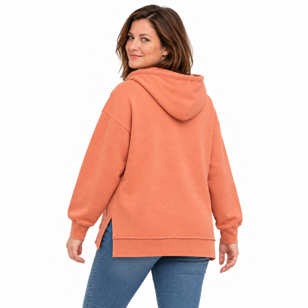 Coral orange Deadwood white applique split-hem hoodie — back model styling preview showing relaxed split hem