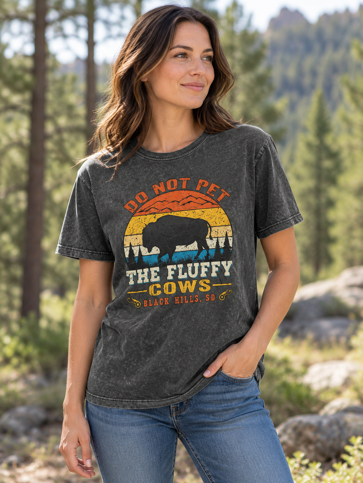 Do Not Pet the Fluffy Cows Black Hills T-shirt in washed black — female model