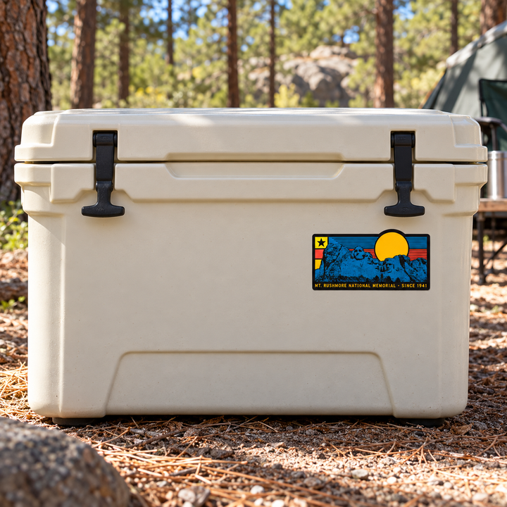 Mount Rushmore Retro Sunset Rectangle Sticker on a camping cooler — realistic scale lifestyle display; accessories not included
