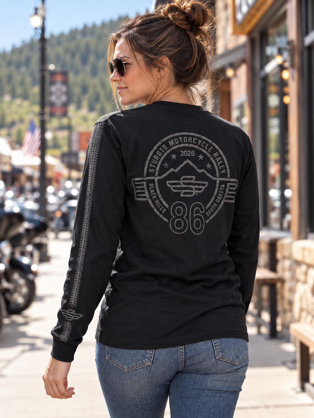 Sturgis 2026 official long sleeve shirt in Black on Black Rough Stripe — female model back view