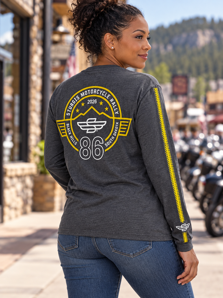 Sturgis 2026 official long sleeve shirt in Heather Charcoal / Yellow Rough Stripe — female model back view