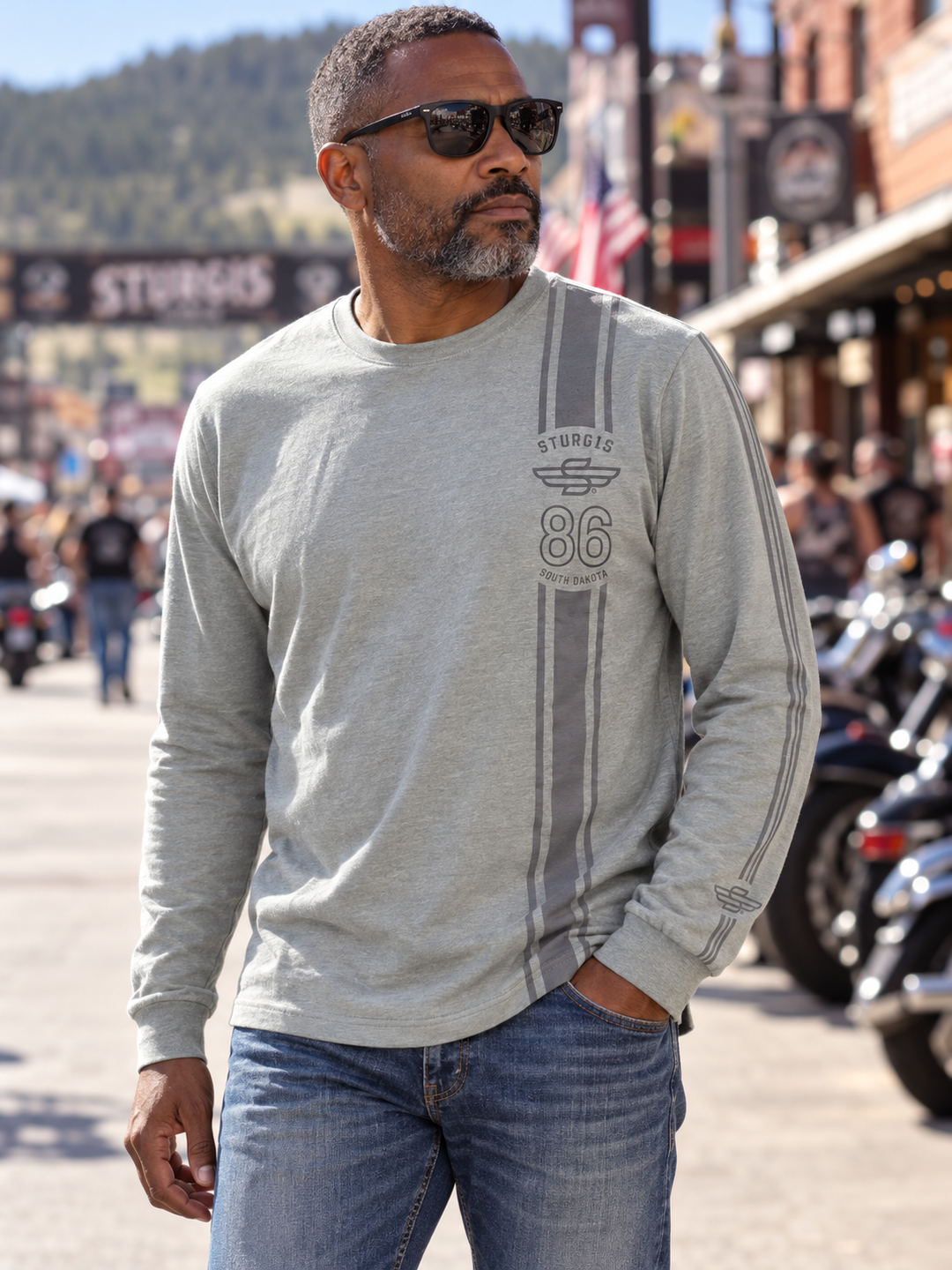 Sturgis 2026 official long sleeve shirt in Heather Gray Racing Stripes — male model front view