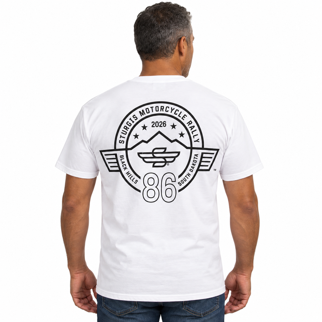 Sturgis 2026 official white T-shirt with black Winged-S rally logo — model back view